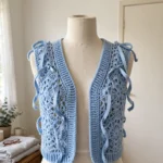 Baby blue ribbon crochet vest