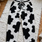 Cow print joggers flat lay
