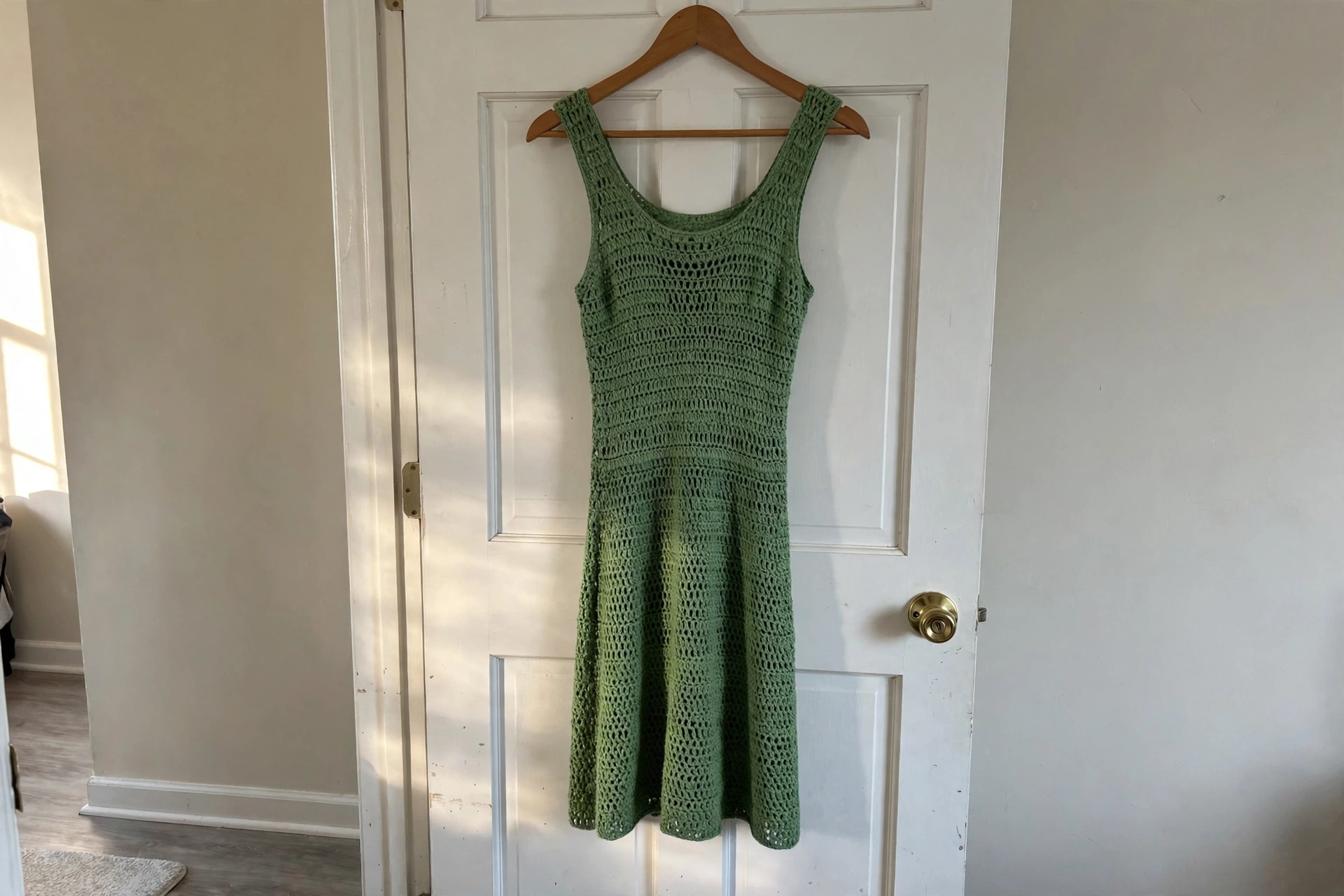 Chic green dress on dress form