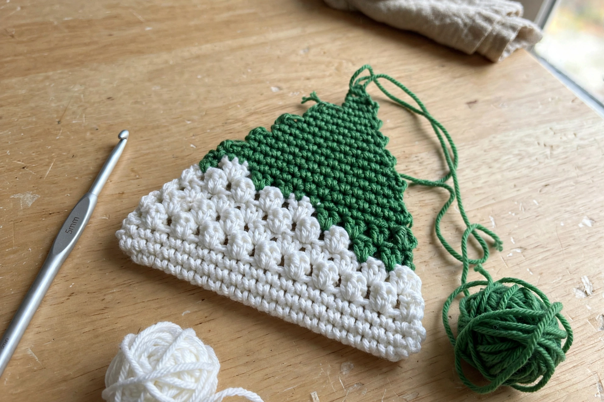 Close-up of the mini bean stitch Christmas trees on the cozy