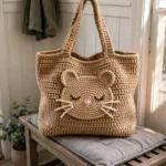 Kitty tote on bench