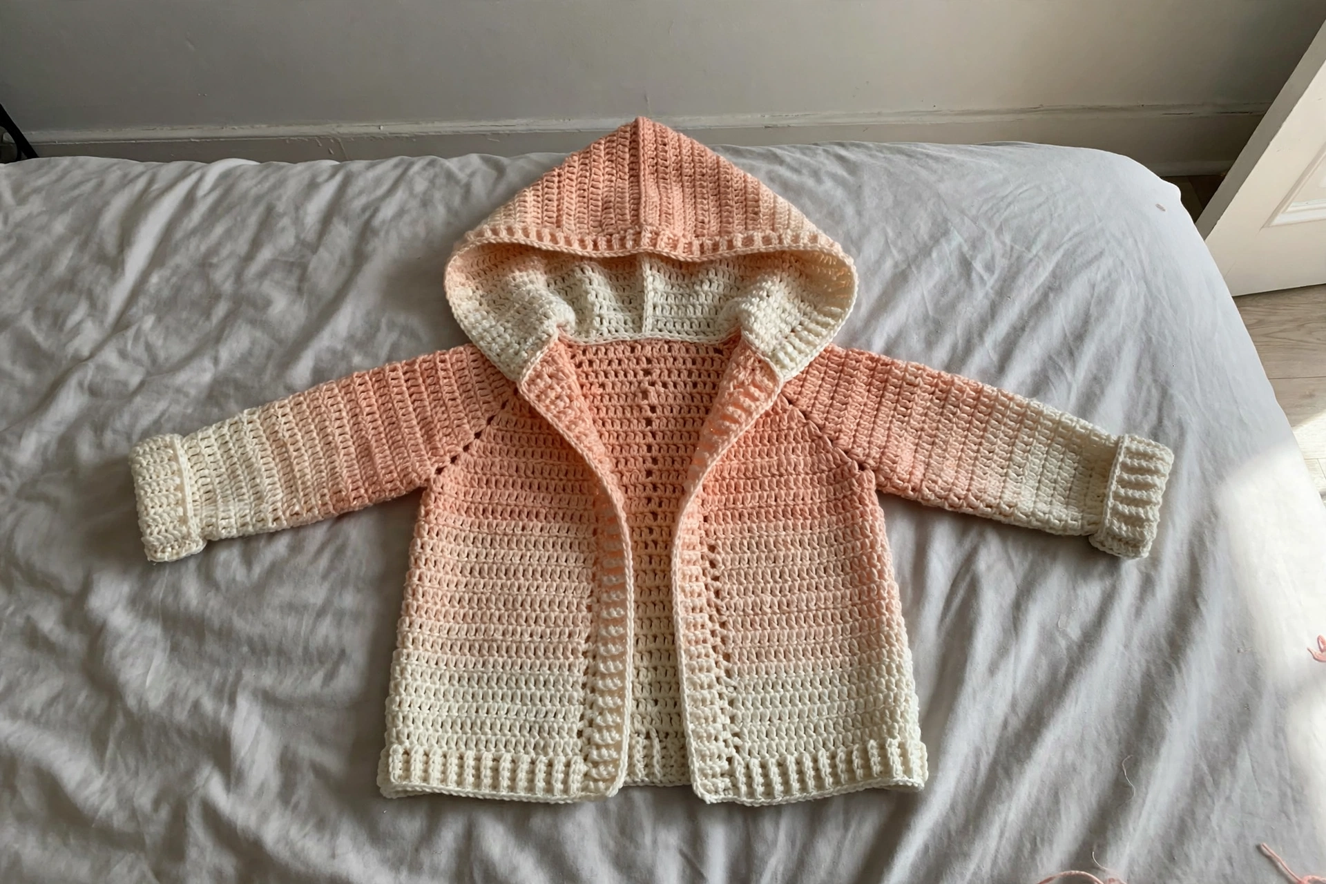 Peach cardigan flat with hood