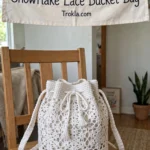 Winter white snowflake lace bucket bag with drawstring top